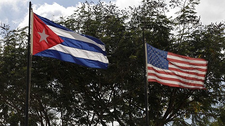 Cuba raises flag in Washington as embassy reopens after half a century